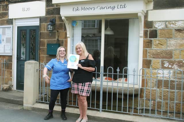 Healthcare Assistant Emma Matthews (left) and Business & Operations Manager Sharon O’Connor outside the Esk Moor Caring Ltd offices in Castleton.