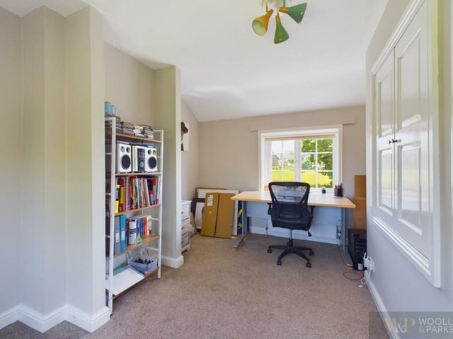 One bedroom is currently used as a home office.