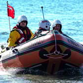 Volunteer Jason Stephenson at the helm of Bridlington RNLI inshore lifeboat. Photo courtesy of RNLI/Mike Milner.