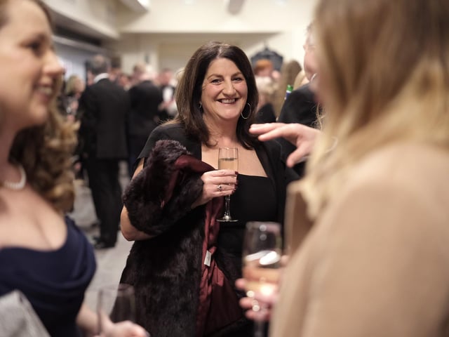 Judge Tracy Calcraft shares a drink with friends