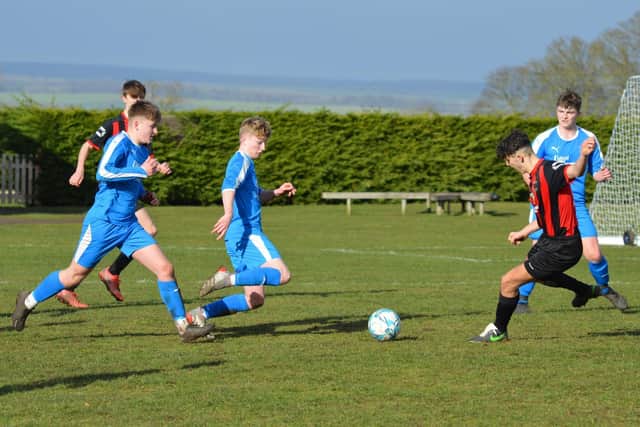 Heslerton Under 16 (blue) v Huntington Rovers Photo by Cherie Allardice