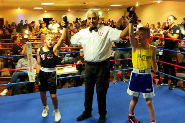 Paul Barber, right, celebrates after his Leeds bout.