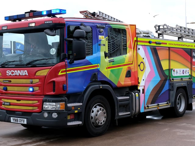 A fire engine joins the parade.