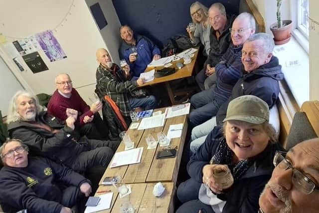 Drinkers enjoying a relaxing pint!