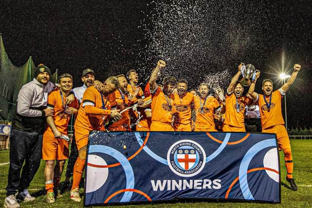 Edgehill crack open the champagne after winning the North Riding FA Saturday Challenge Cup final,. Photo by Karen Harland Photography