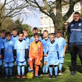 Bridlington Sharks U8 football team raised funds for the club by running the full course with a ball and passing it between themselves all the way around the 5km