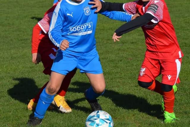 Heslerton Under-7s in action against Scarborough
