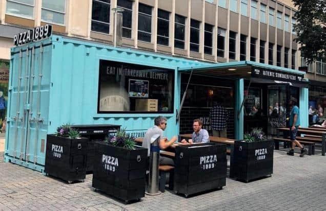 How the shipping container bar could look