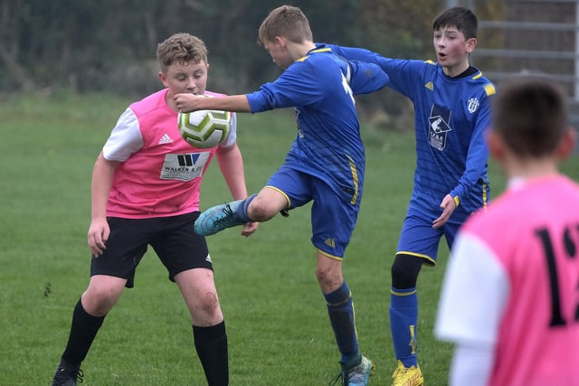 Eastfield Under-13s look to get the ball under control at Ayton Under-13s