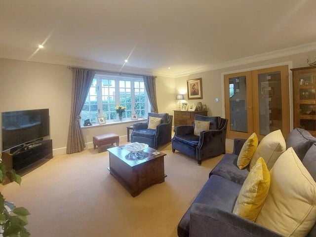 The sizeable lounge benefits from a large window that admits plenty of natural light.