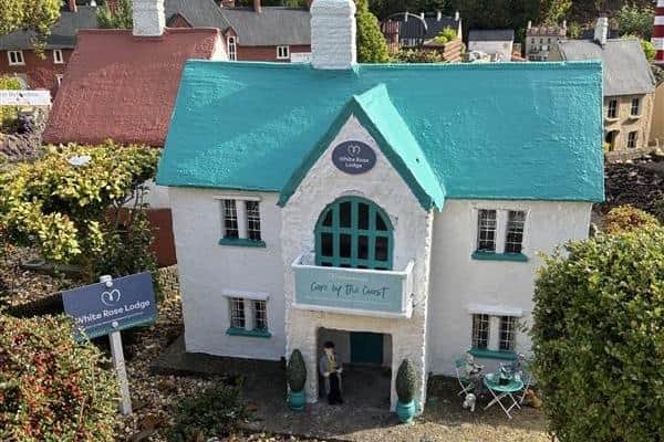 The miniature White Rose Lodge at Bondville Model Village