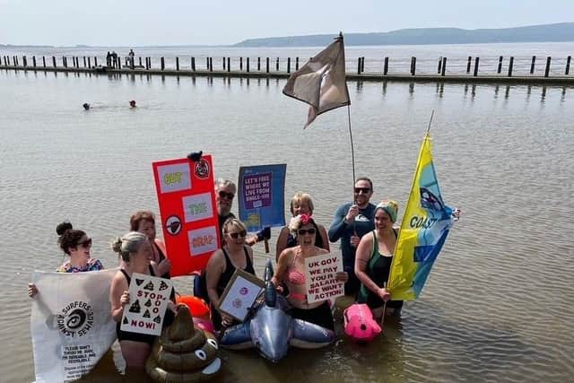 Campaigners displayed their Brown Flag at a clean beach protest
