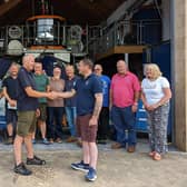 Incumbent mechanic Dave Horsley, left, passes the baton to Pete McGeown. (Photo: Scarborough RNLI)