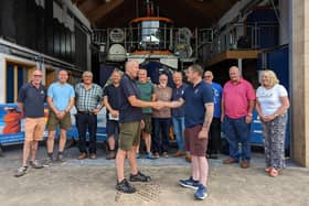 Incumbent mechanic Dave Horsley, left, passes the baton to Pete McGeown. (Photo: Scarborough RNLI)
