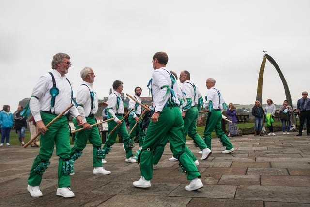 Whitby Folk Week dancers near the Cook Statue on the West Cliff.
Picture: Ceri Oakes.