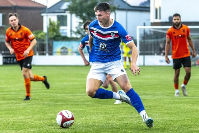 James Harrison on the ball for the home side. Photo by Brian Murfield