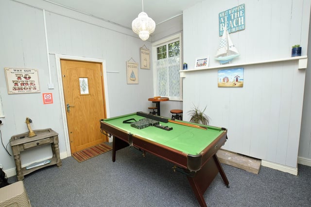 This games room is a versatile space that could suit various purposes.