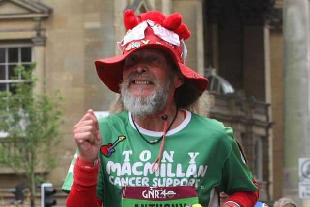 Tony Robinson is celebrating his 70th birthday with 70 seven-mile runs, a half marathon and a full marathon in memory of his friends.