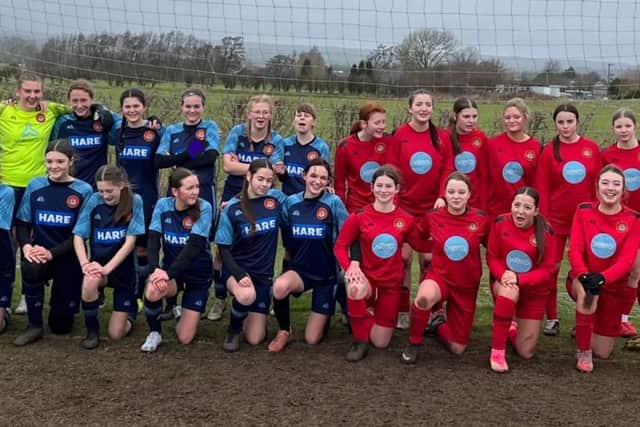 Scarborough Ladies FC Under-15s, red kit, and Scarborough Ladies FC Lionesses U15s line up before their derby match at Sherburn.