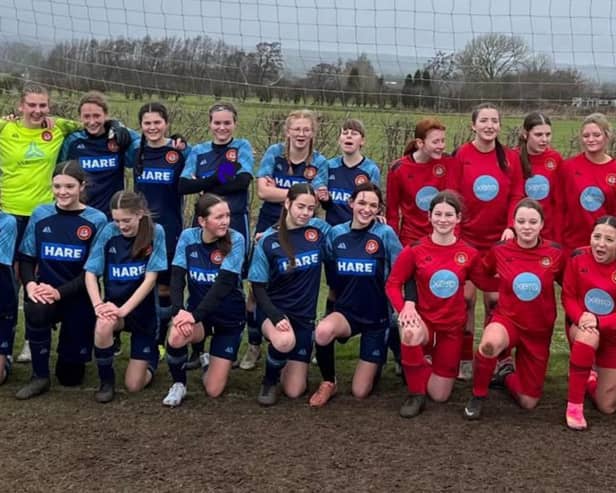 Scarborough Ladies FC Under-15s, red kit, and Scarborough Ladies FC Lionesses U15s line up before their derby match at Sherburn.