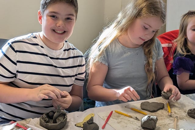 Youngsters working on their designs.