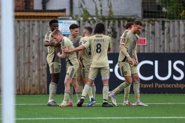 Boro players congratulate Dom Tear after he scored the winner at Marine on Saturday afternoon. PHOTOS BY ZACH FORSTER
