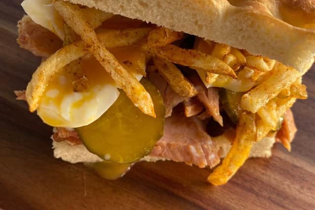 The Ham Egg 'N Chips - slow-cooked (in coco-cola) ham, soft-boiled egg, home-made pickles, shoestring chips & soft home baked bread.