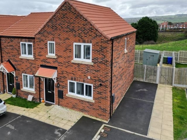 This modern family home has a south-facing garden, with a patio accessible through French doors from the house interior. It is for sale with Hope and Braim estate agents, tel. 01947 601301.