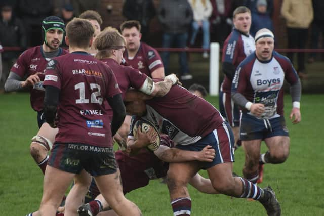 Ropeti Ropeti runs into a tackle at Morley. PHOTOS BY CHARLIE HOPPER