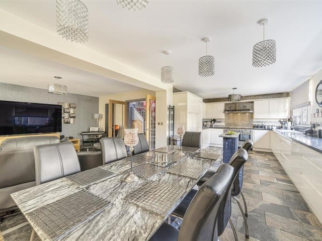 The stunning open plan living kitchen with diner.