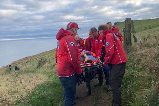 The woman sustained a lower leg injury on the Cleveland Way near Whitby