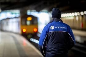 A Northern train arriving at the station.