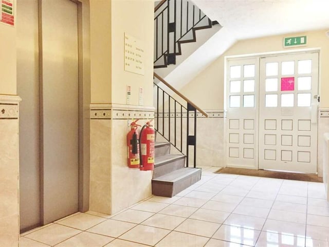 The entrance to the building offers both stairs and lift to apartments.
