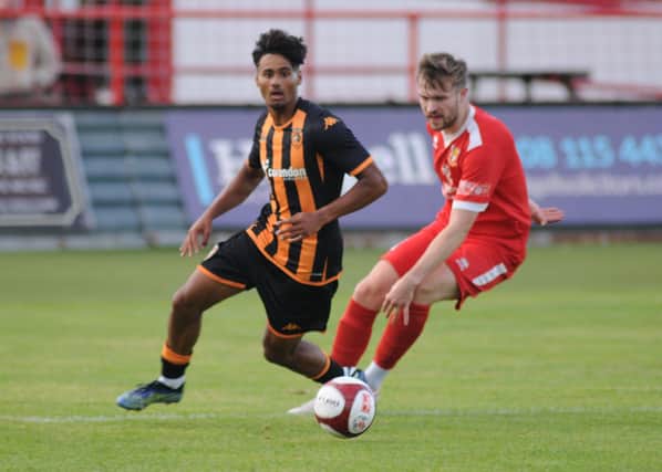 Matty Dixon in action for Brid Town against Hull U21s.