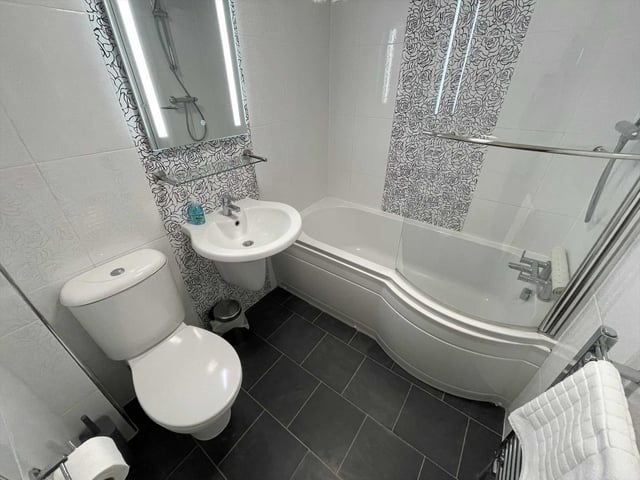 One of the bathrooms within the three-floor house.