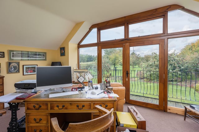 This room, currently used as a study and ideal for home working, has garden views.