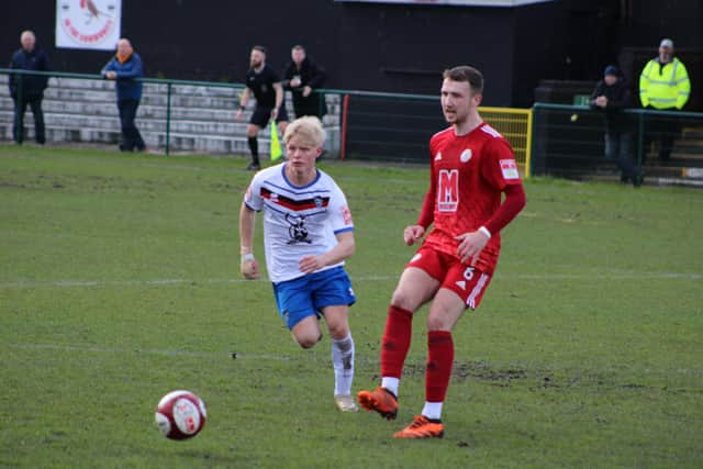 Max Howells in action for Town at Ashton United.