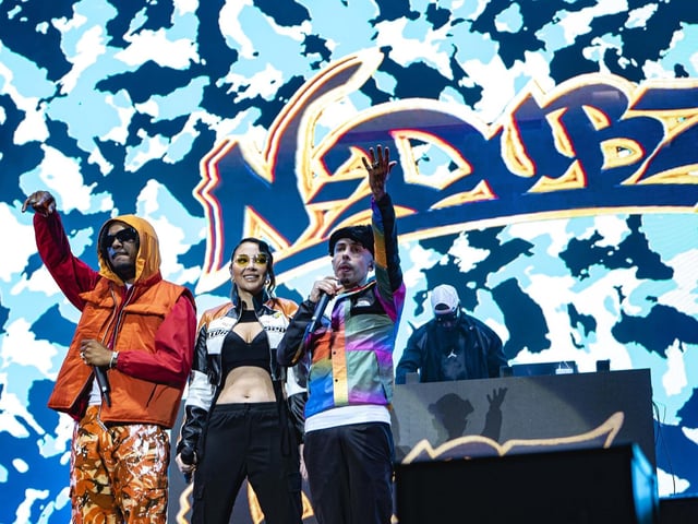 N-Dubz stars wave to the crowd.