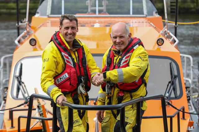 Whitby RNLI Station Mechanic Richard Dowson with volunteer Keith Attridge.
