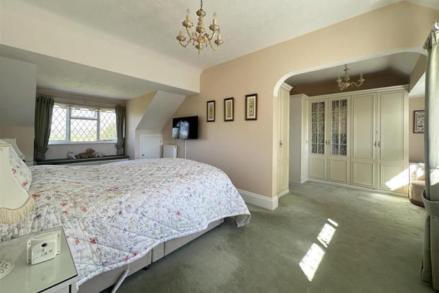 The main bedroom has its own dressing room and en suite facility.