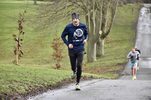 Paul Good (Bridlington Road Runners), who eventually claimed second spot, sets the early pace at the Sewerby Parkrun PHOTOS BY TCF PHOTOGRAPHY