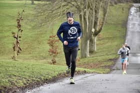 Paul Good (Bridlington Road Runners), who eventually claimed second spot, sets the early pace at the Sewerby Parkrun PHOTOS BY TCF PHOTOGRAPHY