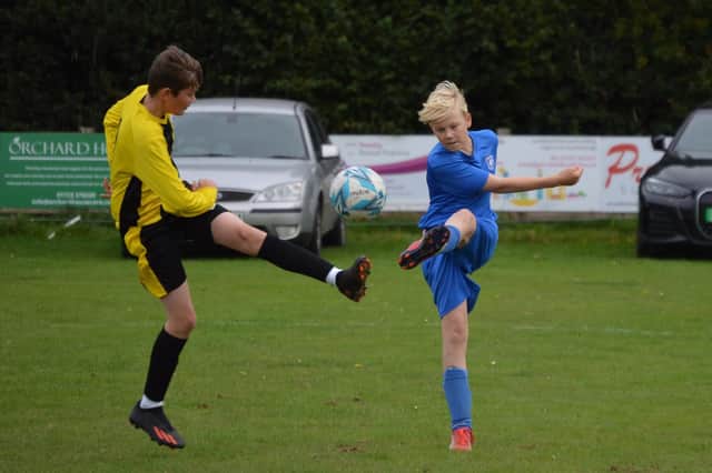 Heslerton Under-14s, blue kit, in action against Scalby Under-14s  PHOTO BY CHERIE ALLARDICE
