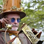 The Filey Steampunk Festival . Keith Dawson making a call on the Steampunk line
