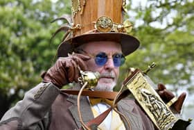 The Filey Steampunk Festival . Keith Dawson making a call on the Steampunk line