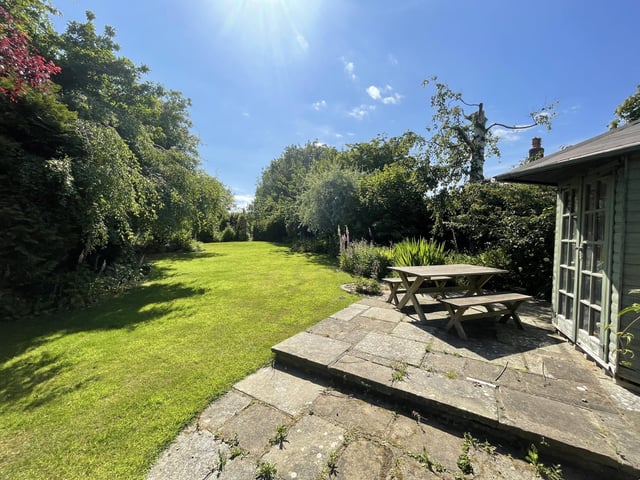 View of part of the extensive garden with The Granary
