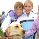 Sophie Morgan, Megan Wade, and Faye Wade with Oake at the Lions Carnival. (PA0531-15d)