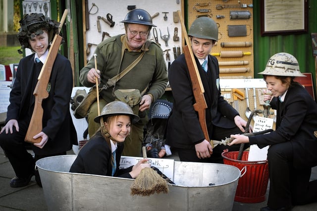 Scalby School pupils learn about world war two experiences, from left: Denver Concannon, visitor John Girling, Emily Baker, Jacob Beaumont, Caitlin Addey.
Picture Richard Ponter 124622