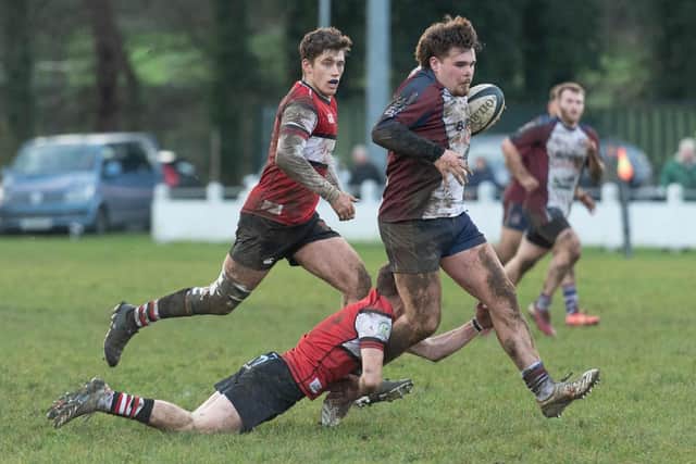 Seb Holloway on the run for the visitors. Photo by Andy Standing