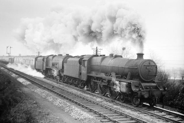 Newcastle-Liverpool drawing out of Leeds headed by "Tanganyika" Jubilee 45631 Class 5XP supported by Class 6P Royal Scot No. 46137  "Prince of Wales Volunteers".